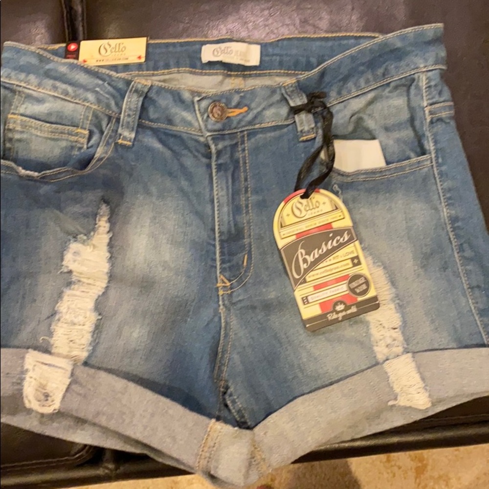High waisted distressed denim shorts